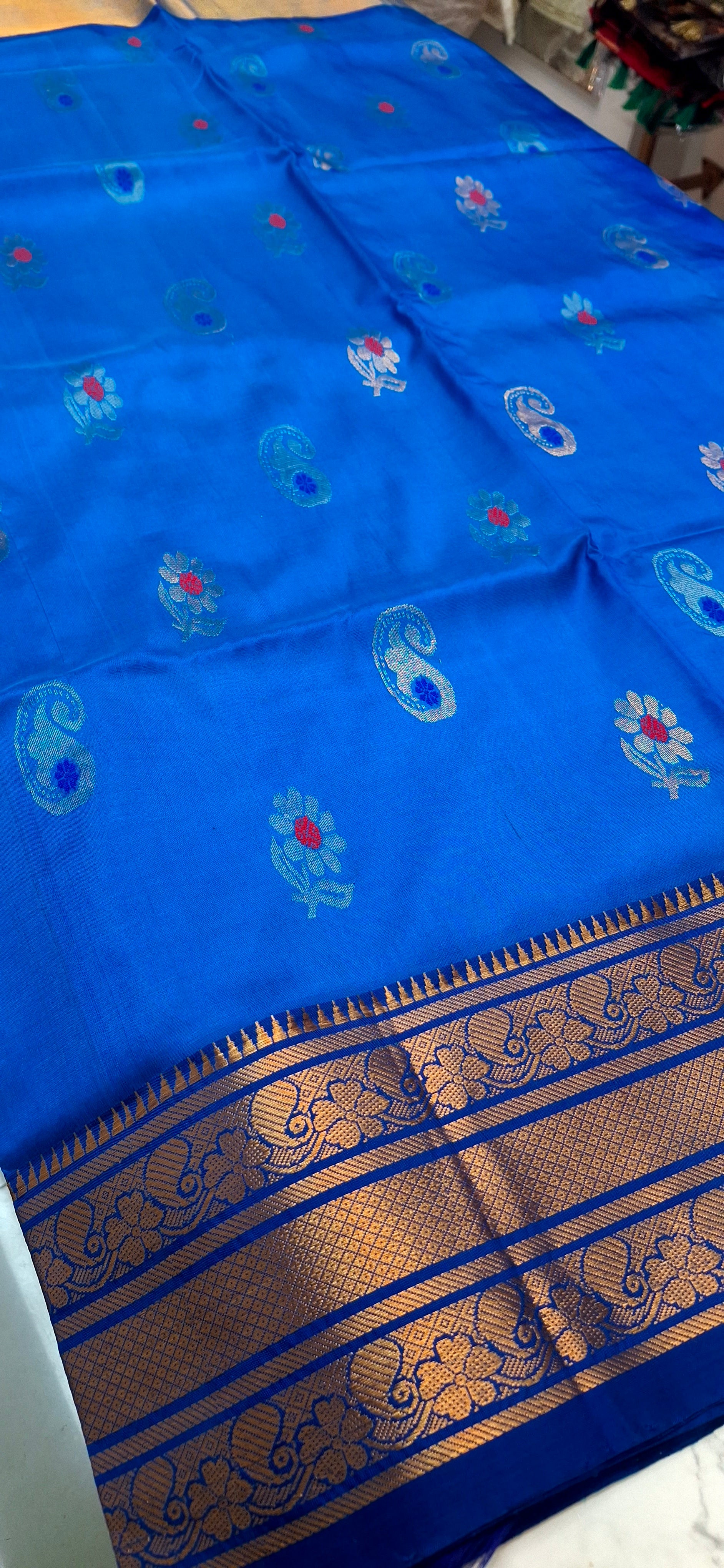 PURE SILK HANDLOOM BLUE UPPADA IN GOLD AND SILVER BUTTI